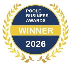 A blue and gold laurel wreath badge, featuring the Magna Blueflame accent, displays the text: POOLE BUSINESS AWARDS WINNER 2026.